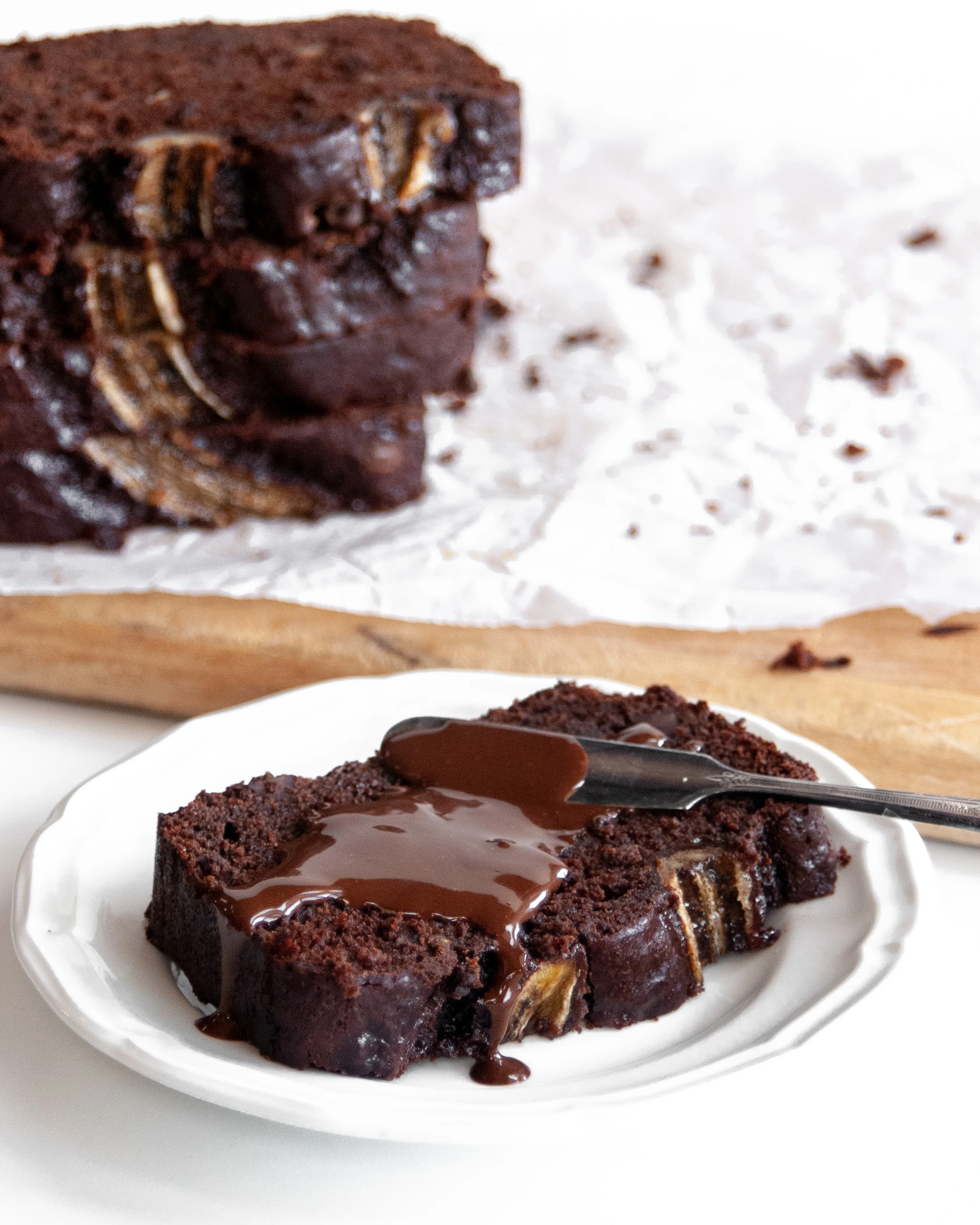 Slice of Vegan Triple Chocolate Banana Bread served with Chocolate Spread