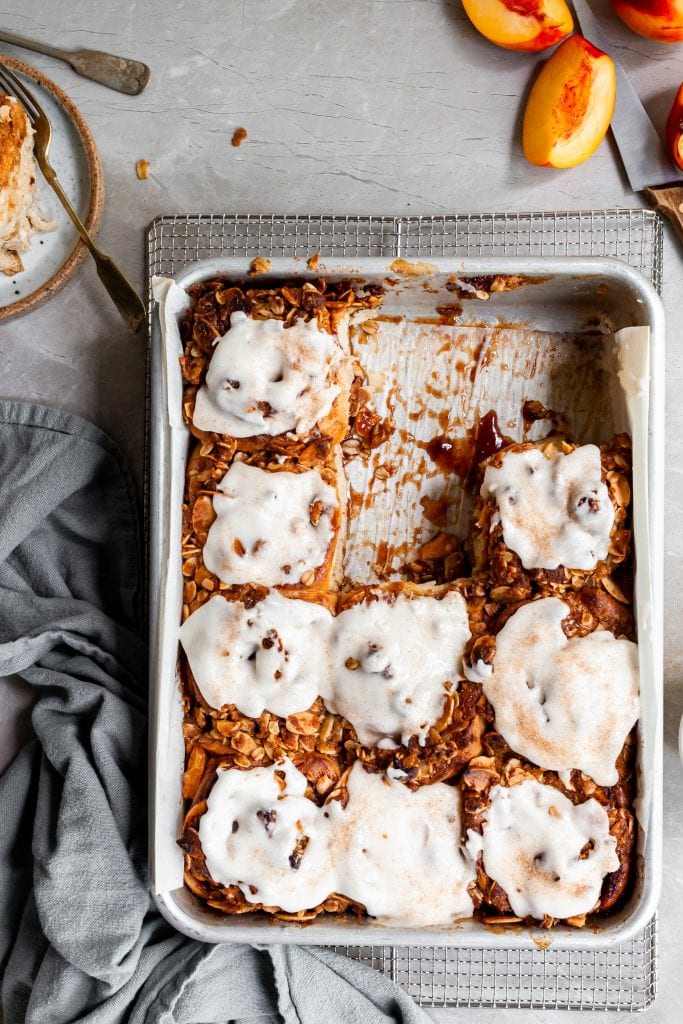 Tray of cinnamon rolls, with 3 out of the 12 missing