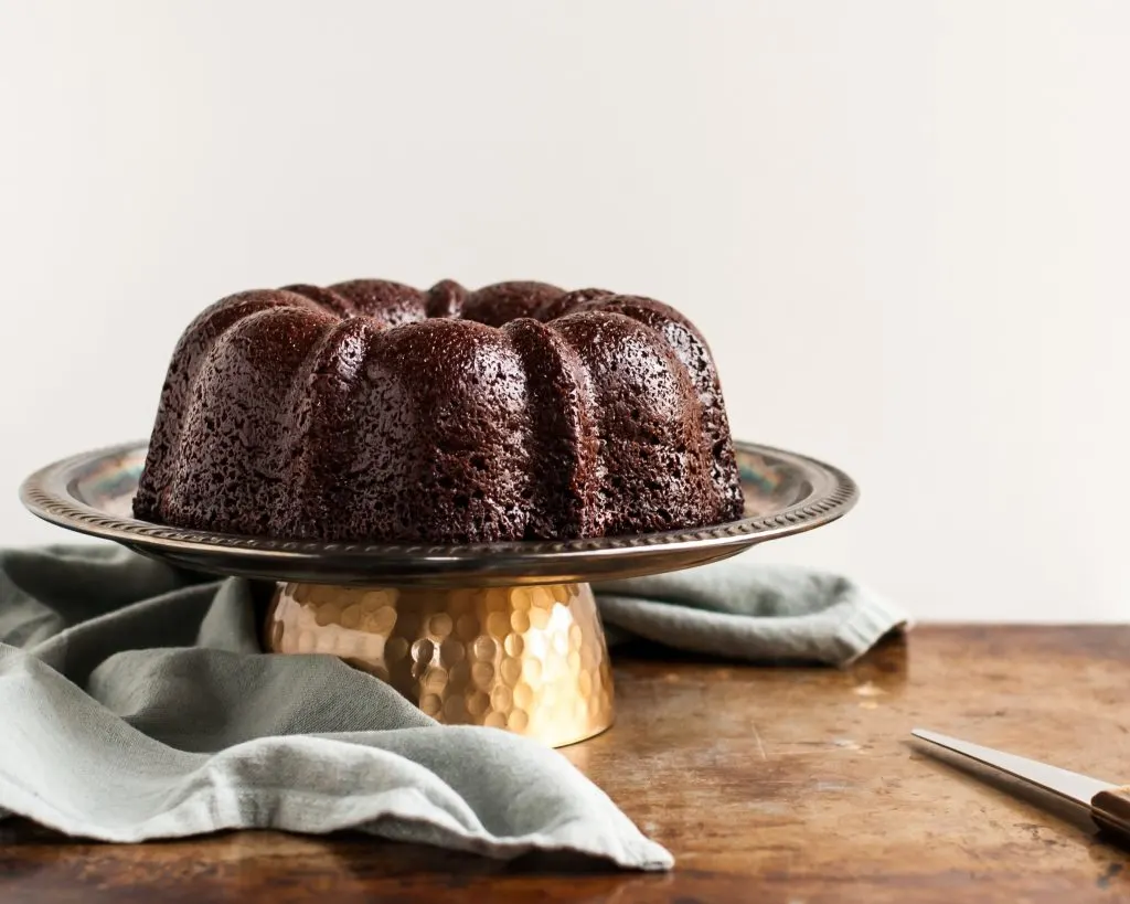 Vegan Chocolate Bundt Cake just before peanut butter glaze is poured over