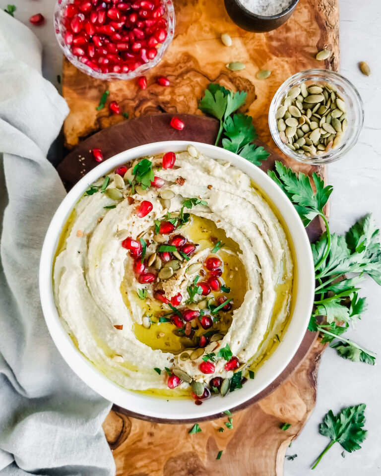 Roasted Pumkin Seed Hummus served with pomengrante seeds, olive oil drizzle and fresh parsley