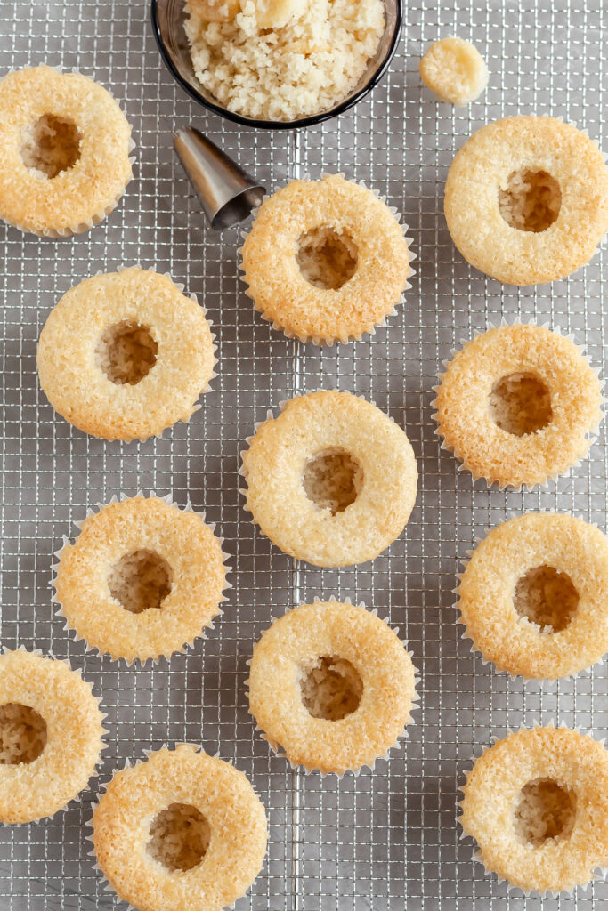 Vegan Coconut Cream Cupcakes with centers removed, ready for custard filling