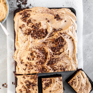 Vegan Chocolate Sheet Cake with Fluffy Espresso Frosting with 3 squares cut