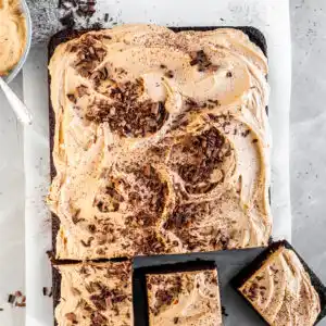 Vegan Chocolate Sheet Cake with Fluffy Espresso Frosting with 3 squares cut