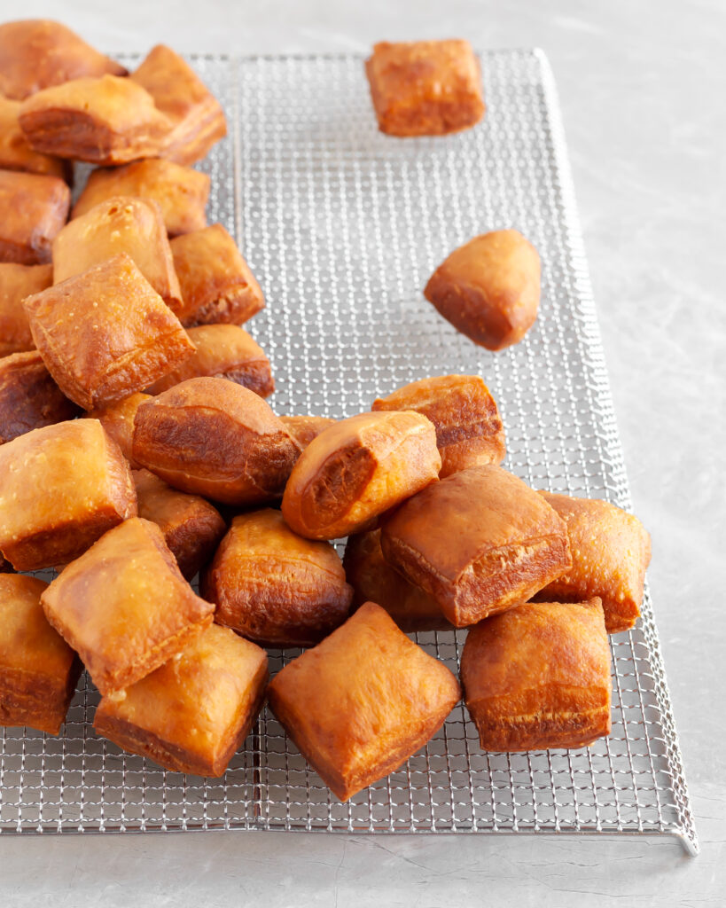 Fresh Vegan Beignets on cooling rack