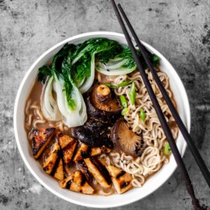 Flatlay of 1 bowl of Vegan Mushroom Miso Ramen