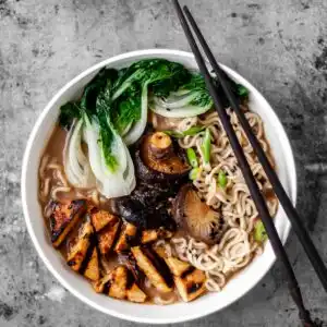 Flatlay of 1 bowl of Vegan Mushroom Miso Ramen