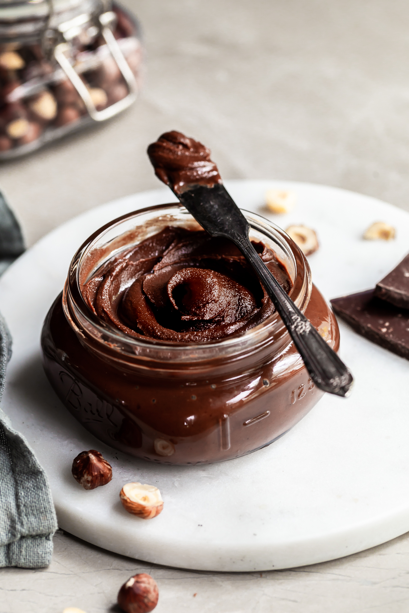 Side view of a jar filled with vegan nutella